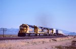 AT&SF, Santa Fe SD40-2 5155- U36C 8798- SD45-2 5663 & 5637, with a westbound trailer train at Goffs, California. June 22, 1984. 